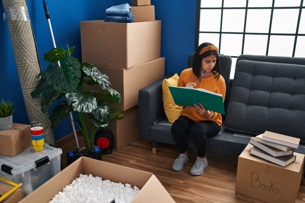 Homeowner documenting household belongings for an insurance inventory